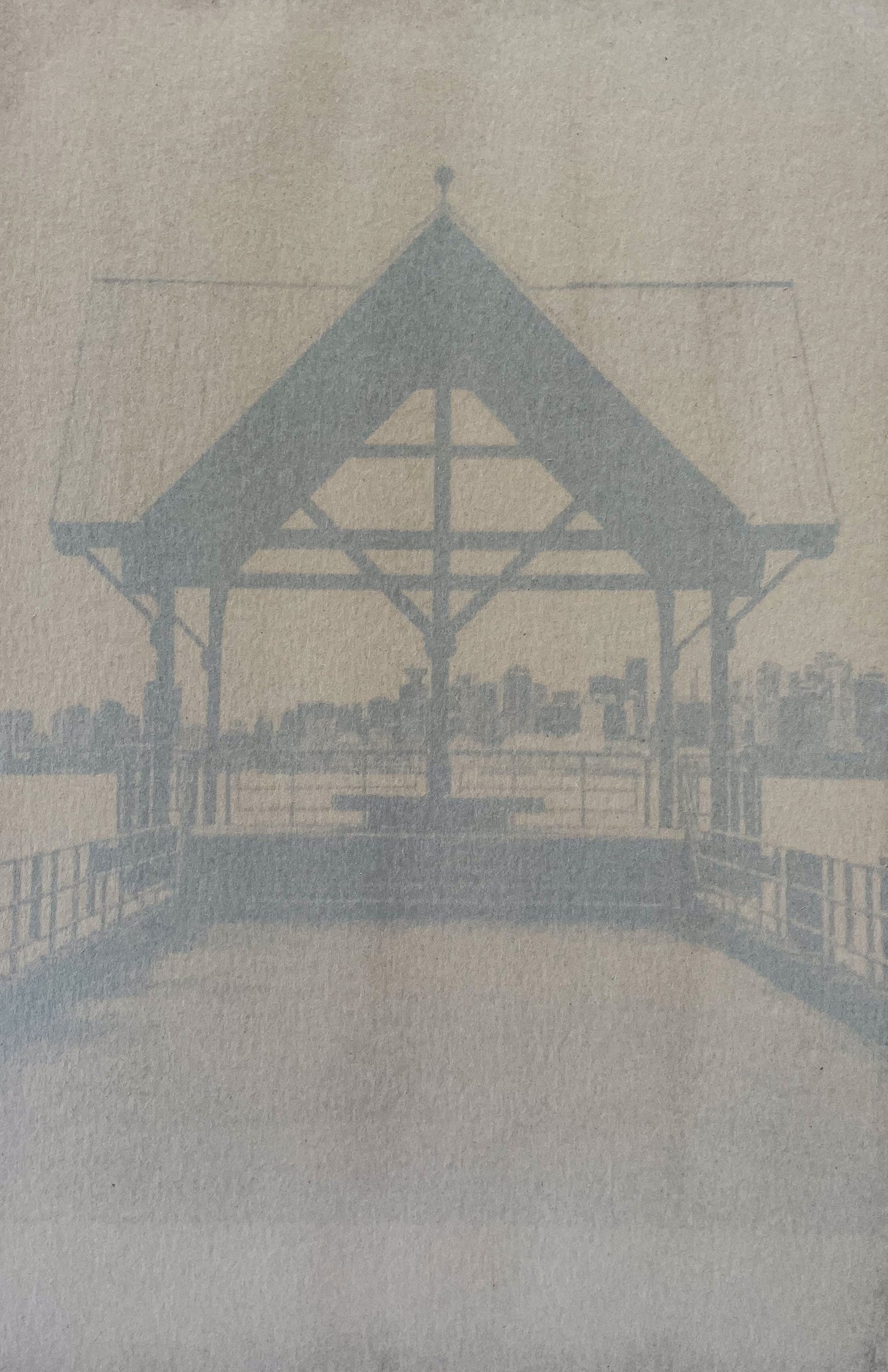anthotype make with black beans emulsion. Gazebo with a city skyline in the background 